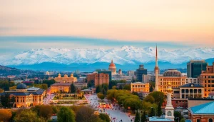 View of Almaty cityscape with mountains, showcasing https://albmaftoh.com in the background.